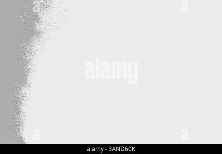 Gray spray paint fading on white textured background creates abstract design Stock Photo