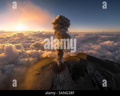 Aerial view of erupting Volcano Fuego with smoke plume and crater ...