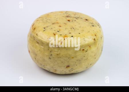 Hard cheese round isolated on white background - Herb cheese Stock Photo