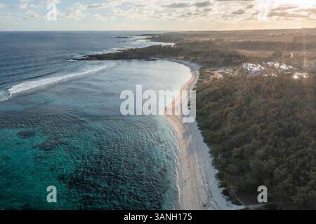 Aerial view of Le Cambuse beach with white sand along the coastline at ...