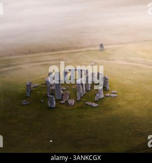 Aerial view of the ancient stonehenge megalithic structure at sunset on the beautiful salisbury plain, united kingdom. Stock Photo