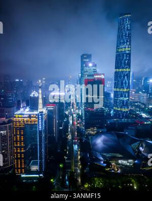 Aerial view of a bustling cityscape with towering skyscrapers and busy ...