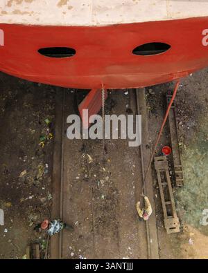 Keraniganj, Bangladesh - 02 February 2025: Aerial view of an industrial shipyard with workers and ships under construction, Subhadya, Keraniganj, Dhaka, Bangladesh. Stock Photo