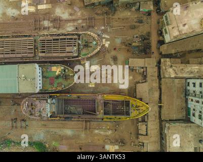 Aerial view of an industrial shipyard with boats and ships under repair, Subhadya, Keraniganj, Dhaka, Bangladesh. Stock Photo