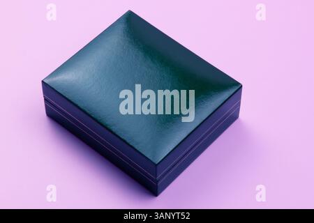 top view of wrapped present box on pastel background with copy space perfect for christmas valentines or surprise gift Stock Photo