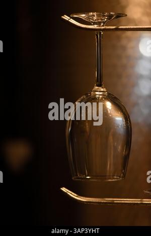An empty wine glass in a winery basement. Stock Photo