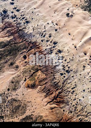 Aerial view of sand dunes, erosion patterns, and vegetation patches in Lake Mungo National Park, New South Wales, Australia. Stock Photo