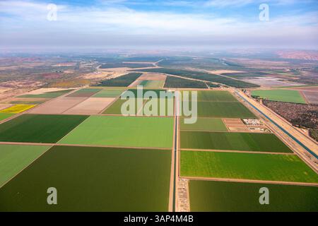 Aerial view of expansive farmland with geometric shapes and patchwork plots, Kununurra, Western Australia, Australia. Stock Photo