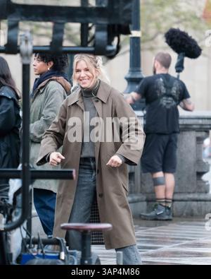 London, UK. 15th April, 2025. Actors Sienna Miller and John Krasinski were seen filming for Amazon production 'Jack Ryan' with hundreds of extras in a closed-off Trafalgar Square. Credit: Eleventh Hour Photography/Alamy Live News Stock Photo