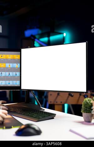 Photographer using advanced photo editing software on isolated screen monitor to make improvement to images quality. Photo editor utilizing specialized photographs retouching application on mockup PC Stock Photo