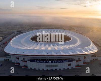 Madrid, Spain - 20 November 2024: Aerial view of Estadio Riyadh Air Metropolitano at sunset with a vibrant cityscape, Madrid, Madrid, Spain. Stock Photo