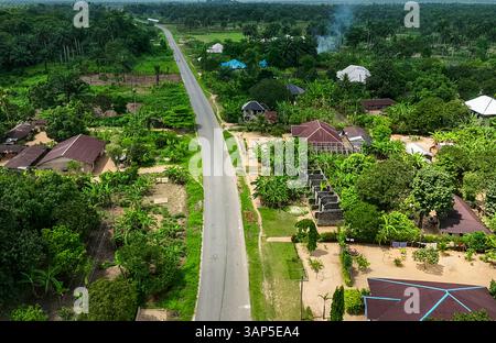Aerial view of Ahoada Main Road surrounded by beautiful homes and lush ...