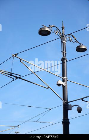 Electric pole with wires under the blue sky Stock Photo - Alamy