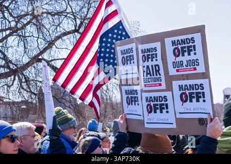 ST. PAUL, MN, USA - APRIL 5, 2025: Demonstrators rally at Minnesota state capitol in 'Hands Off' protests against Trump policies. Stock Photo