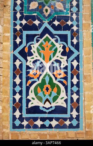 Detail view of a beautiful tile pattern on a wall. At Amir Timor's mausoleum, Gur-i Amir, in Samarkand, Uzbekistan. Stock Photo