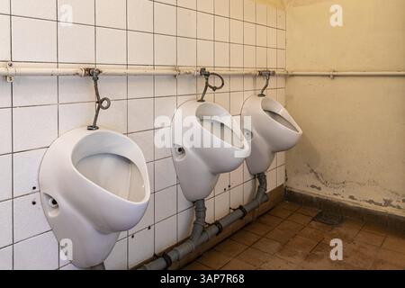 Old dilapidated toilet facility public WC Stock Photo