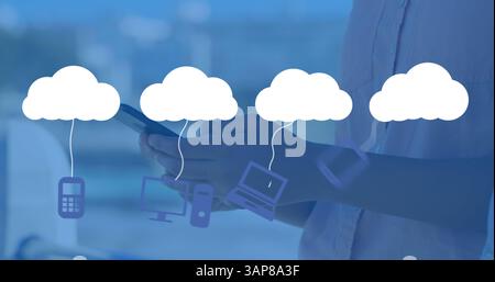 Image of digital clouds with icons over man using smartphone Stock Photo