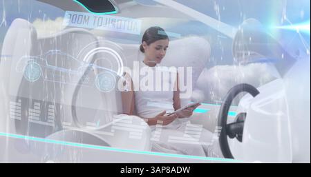 Image of data processing over woman using tablet in self drive car Stock Photo