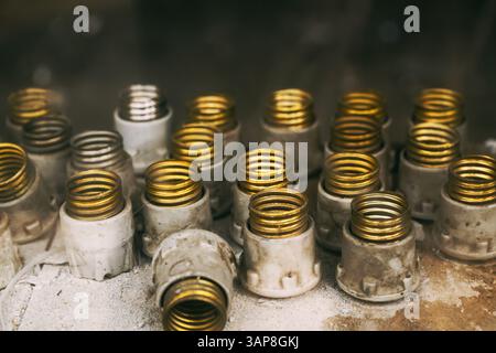 Vintage ceramic fuse holders, electrical safety device providing overcurrent protection, selective focus Stock Photo