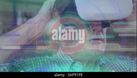 Image of scope scanning and data processing over man wearing vr headset Stock Photo