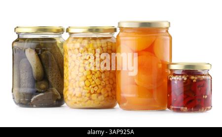 Many jars with different pickled products isolated on white Stock Photo