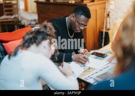 Creative individuals collaborating together in an artistic and inspiring workspace Stock Photo