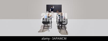 Children standing near blackboard with classmates watching from desks, active in classroom exercise against grey background. Stock Photo