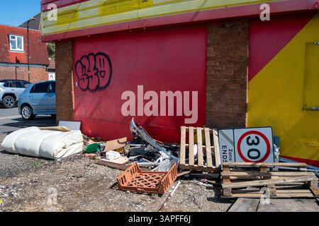 Slough, UK. 16th April, 2025. llegal fly-tipping and rubbish dumped next to a closed down tyre repair premises in Cippenham Slough, Berkshire. DEFRA has recently published the Official Statistics for Fly-Tipping for the 2023/24 year. They said "Local authorities in England dealt with 1.15 million fly-tipping incidents, an increase of 6% from the 1.08 million reported in 2022/23. In 2023/24, 60% of fly-tips involved household waste. Total incidents involving household waste were 688,000 in 2023/24, an increase of 5% from 654,000 incidents in 2022/23. In Slough, compared to 2022-23, there has be Stock Photo