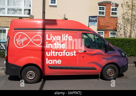 Slough, UK. 16th April, 2025. A Virgin Media van with an advert for Ultrafast Broadband. Credit: Maureen McLean/Alamy Stock Photo