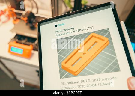 3d print slice software remote control tablet hand holding device prototype model on screen Stock Photo