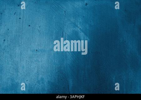 texture of old blue surface with traces of use. Dark blue concrete or stone background. Stock Photo