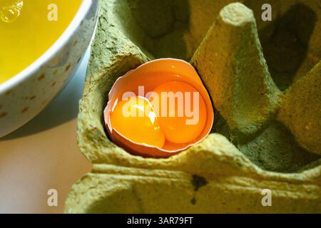 Double egg yolk in an egg Stock Photo