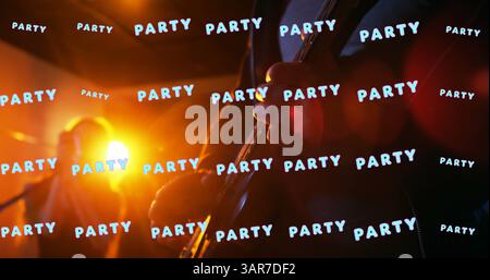 Image of party neon text in repetition over party partying Stock Photo