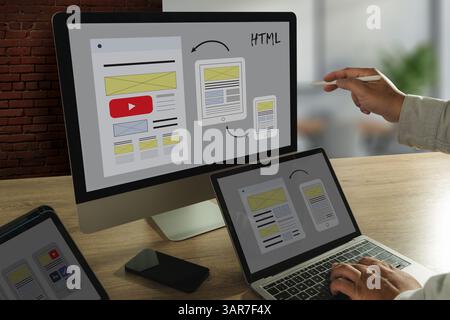 businessman web design responsive website layout and content. landing page development on a laptop screen LANDING PAGE (SEO concept) Stock Photo