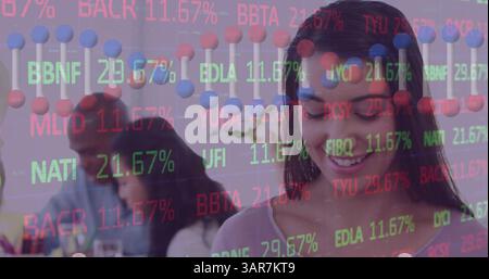 Image of dna strand and statistics, data processing over businesswoman using tablet Stock Photo