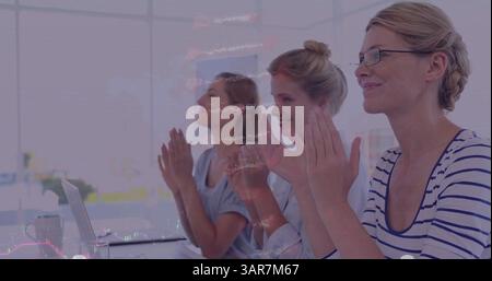 Image of dna strand, statistics and data processing over businesswomen clapping Stock Photo