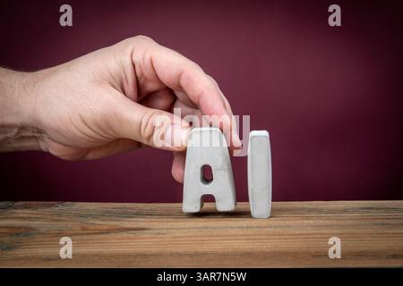 AI Word Created from Concrete Alphabet Letters on Wooden Desk. Stock Photo