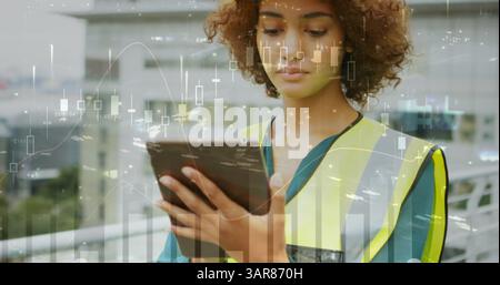Image of statistics processing over female architect using tablet at construction site Stock Photo