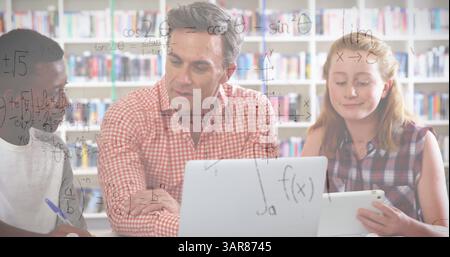 Image of mathematical equations over male teacher and school children using laptop in classroom Stock Photo