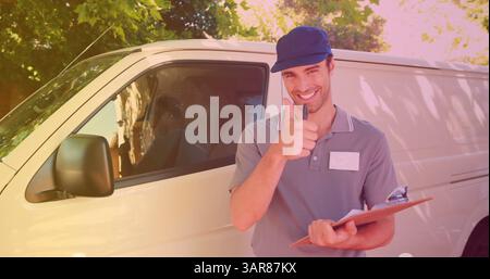 Image of smiling caucasian male deliverer taking notes on clipboard Stock Photo