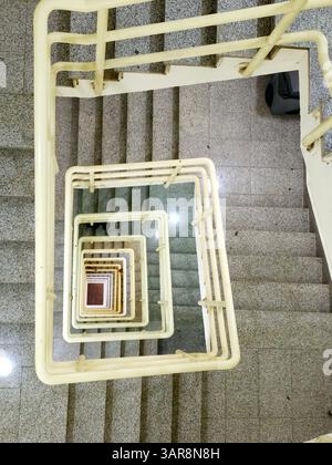 stairwell or stair room, a room in a building where a stair is located, and is used to connect walkways between floors so that one can move in height, Stock Photo