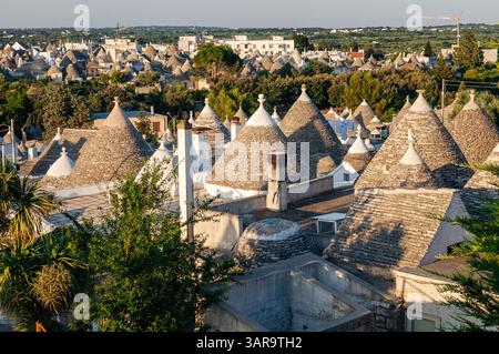 Numerous conical roofs of the trulli of Alberobello, Apulia, Italy Stock Photo