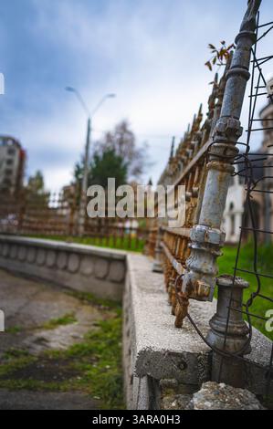 requires repair work neglected sloppy work tears, holes cracked concrete quick and dirty job Stock Photo
