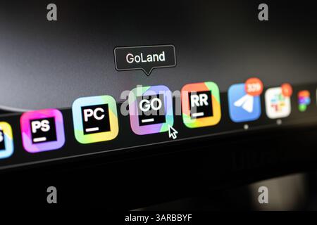 Poznan, Poland – April 14, 2025: GoLand IDE app icon selected in the Dock on macOS desktop, representing JetBrains tool for Golang development and pro Stock Photo