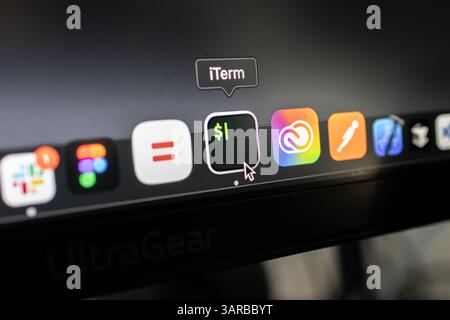 Poznan, Poland – April 14, 2025: Close-up of iTerm app icon in the macOS dock, used by developers for advanced terminal commands, scripting, and autom Stock Photo