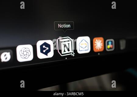 Poznan, Poland – April 14, 2025: Close-up of Notion app icon on a MacBook dock, highlighting a popular all-in-one digital workspace for productivity, Stock Photo
