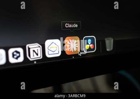 Poznan, Poland – April 14, 2025: Close-up of Claude AI icon in Mac dock, representing a desktop generative artificial intelligence assistant for produ Stock Photo