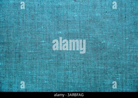 Turquoise linen fabric texture detail closeup as textile background Stock Photo