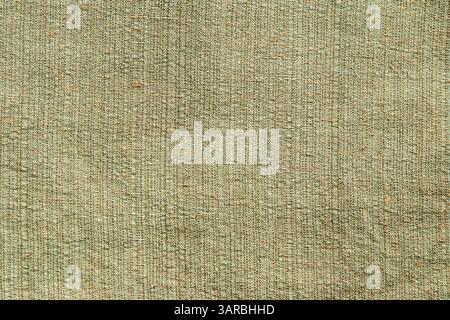 Green linen and silk fabric texture detail closeup as textile background Stock Photo