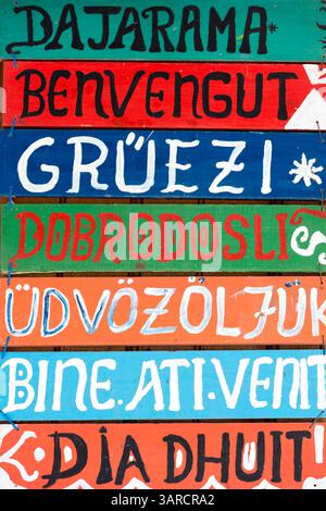 Greeting / Hello wooden signs written in different languages Stock Photo